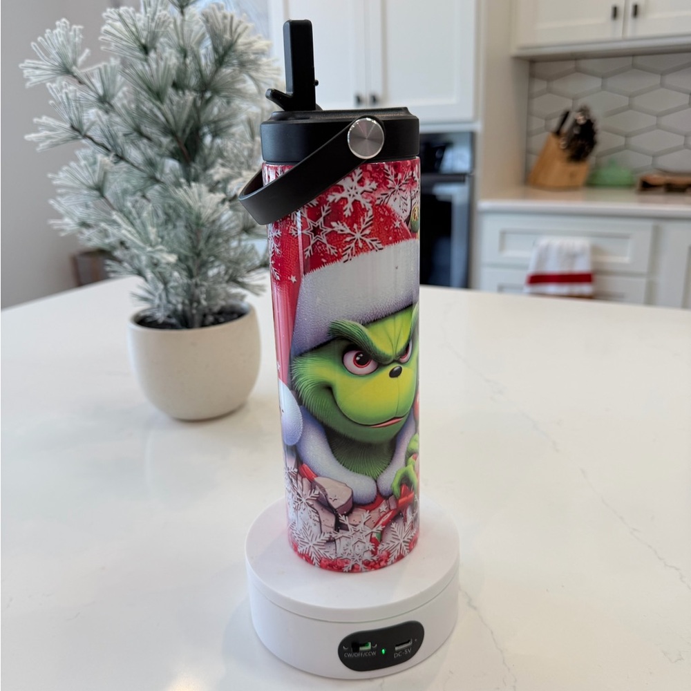 Grinch and jack the skeleton Christmas 20oz tumbler holds cold or hot.